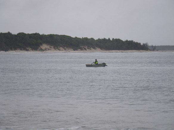 The commercial netters row out their net